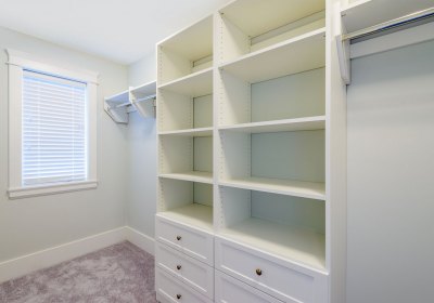 Empty closet, working closet, cupboard in bedroom.